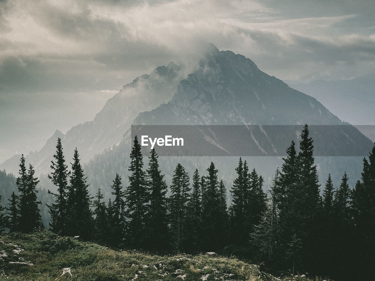 Scenic view of mountains against sky during winter