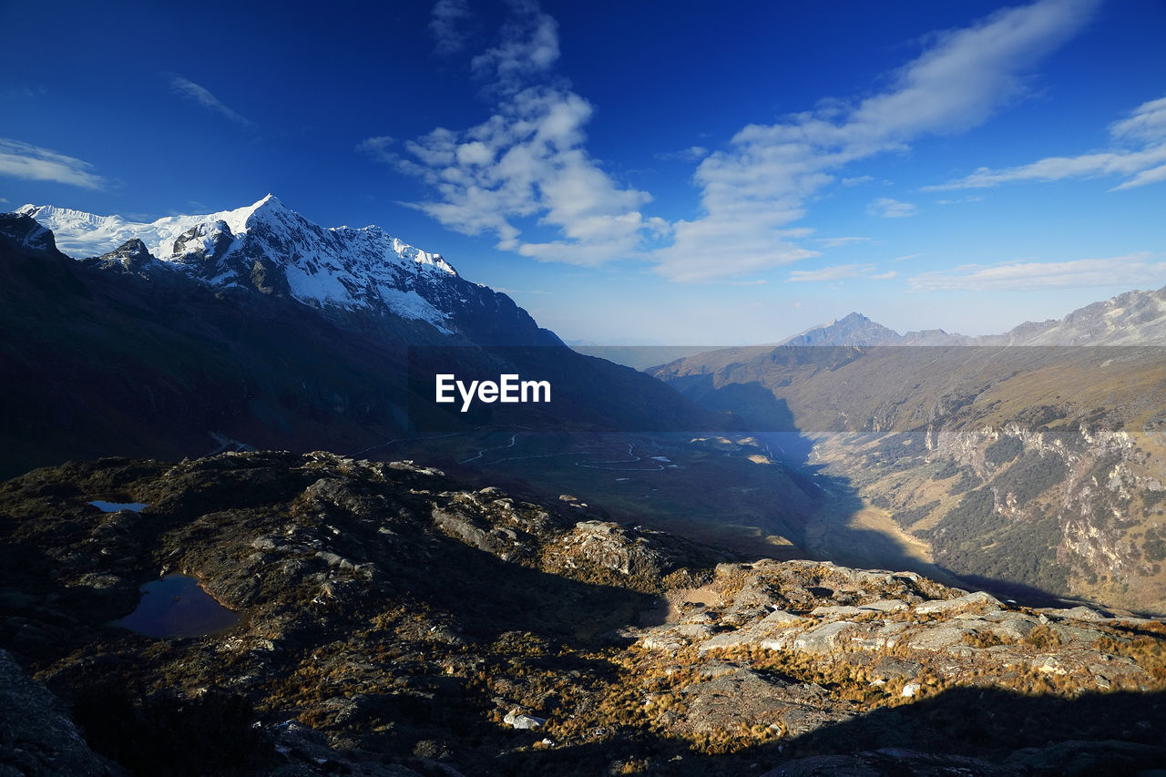 Majestic view of mountain peak against cloudy sky