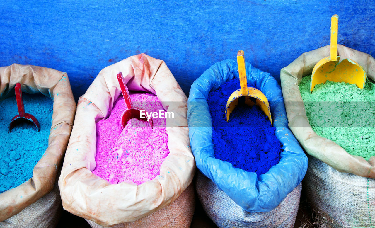 High angle view of powder paints for sale in market