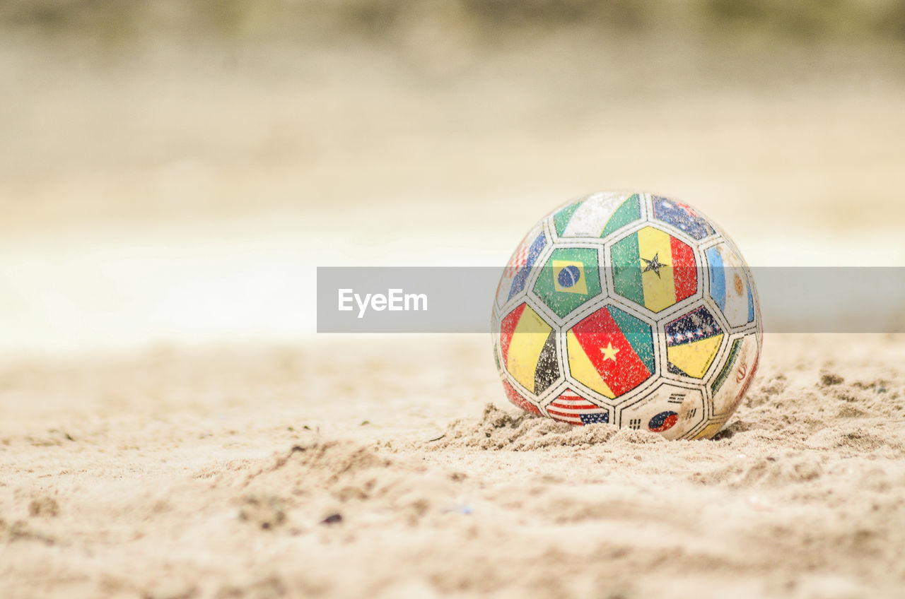 Close-up of ball on sand