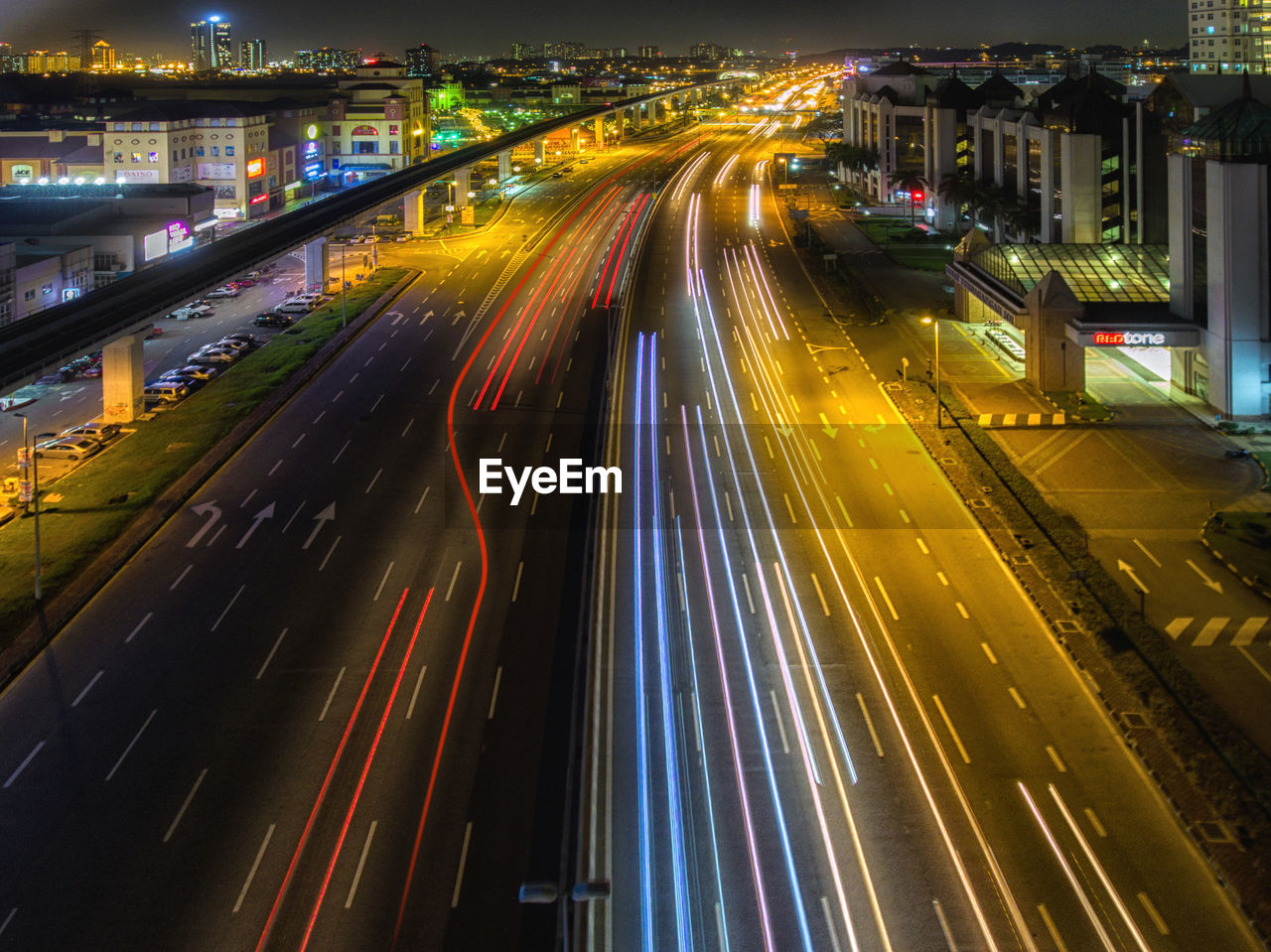 High angle view of light trails on road at night