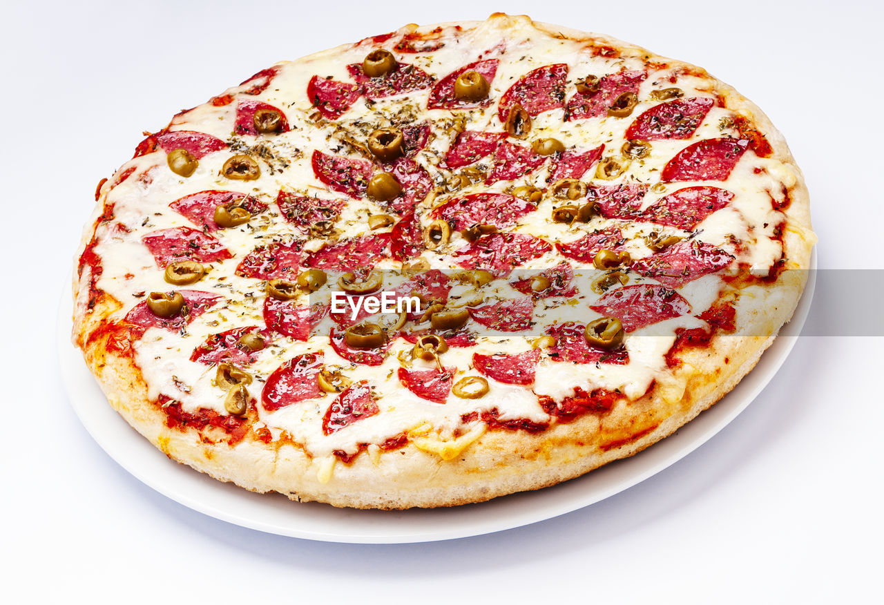 High angle view of pizza on white background