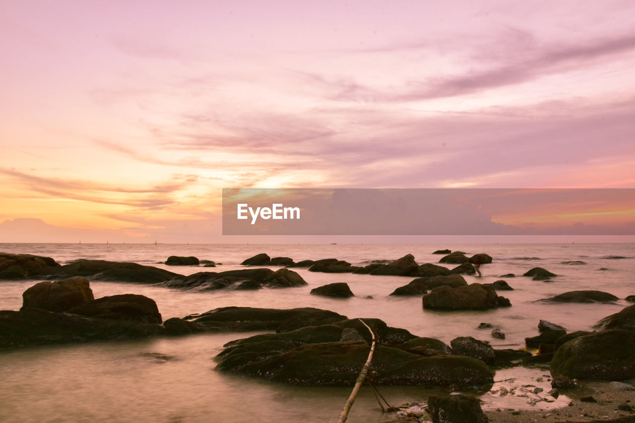 Scenic view of sea against sky during sunset
