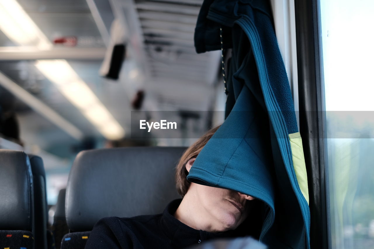 Woman relaxing in train