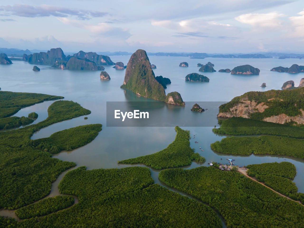 high angle view of sea and mountains against sky