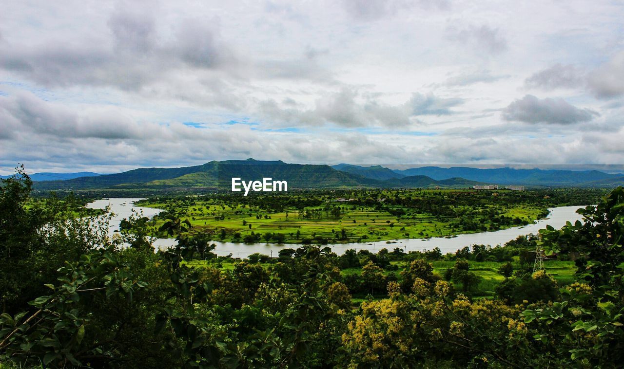 SCENIC VIEW OF CALM LAKE