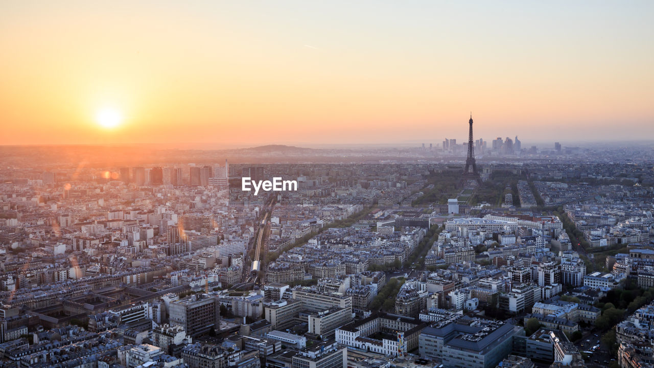 High angle view of cityscape against sky during sunset