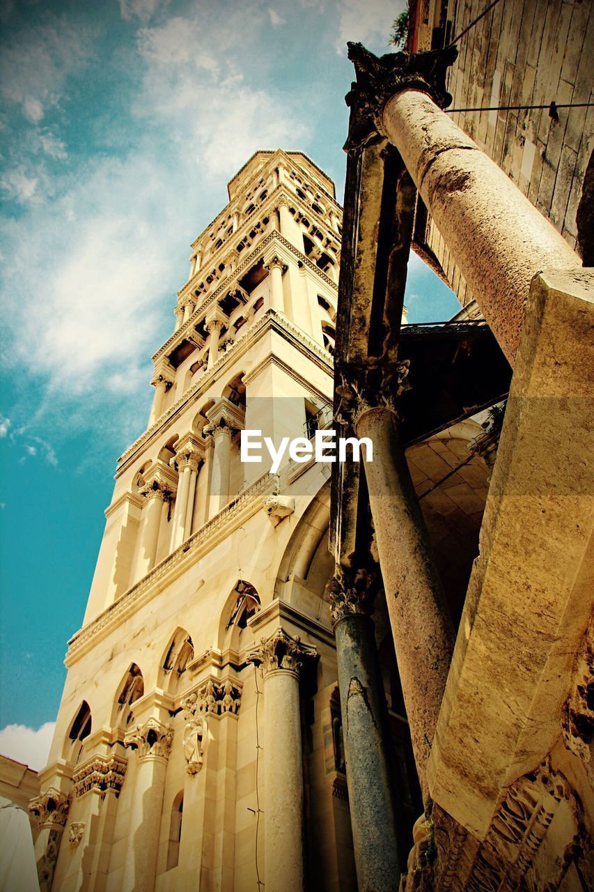 Low angle view of historic building against sky in city