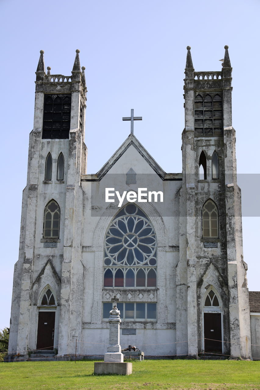 Low angle view of building against sky, old cathedral.