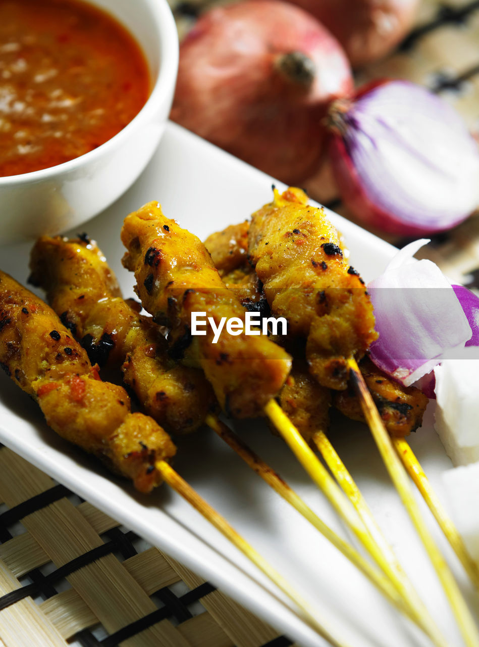 Malaysia famous street food ,grill satay chicken with sweet peanut curry sauce