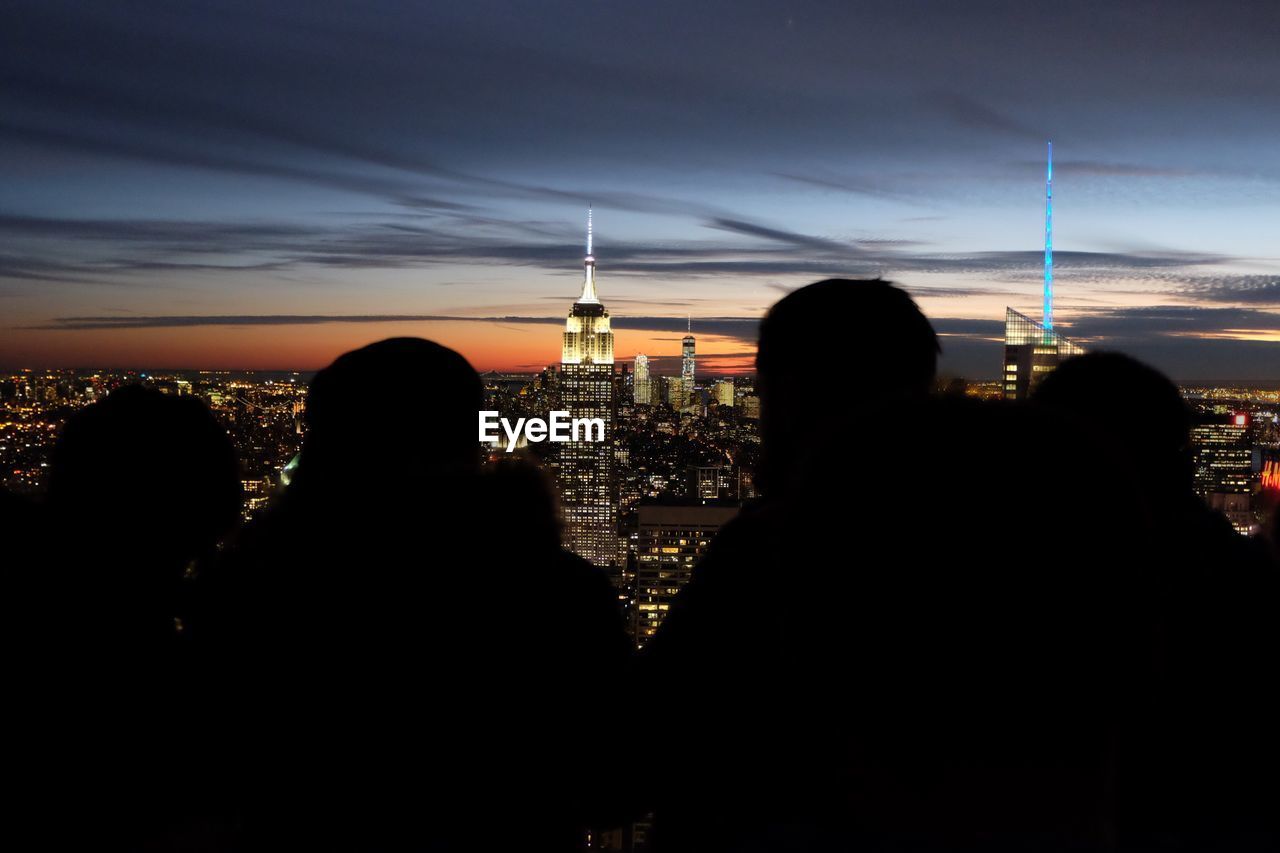 Silhouette of city at night