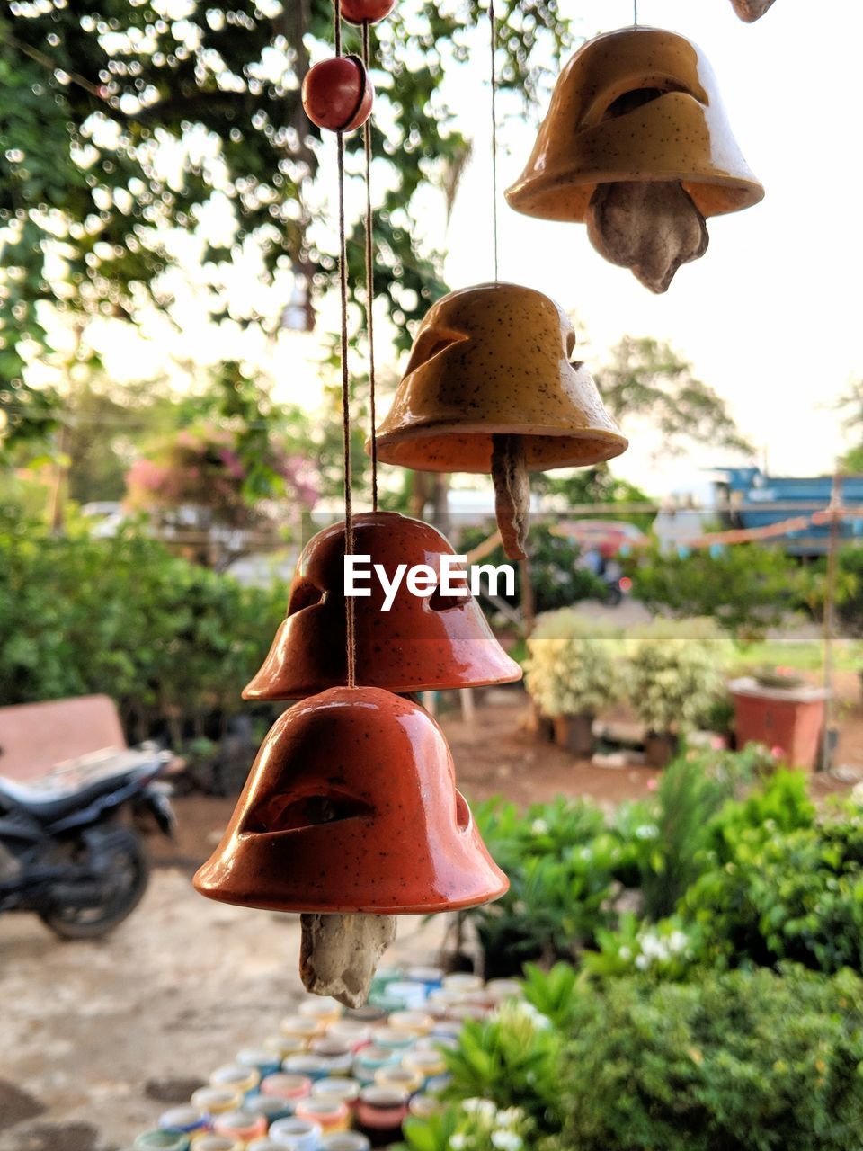 CLOSE-UP OF ELECTRIC LAMP HANGING ON METAL