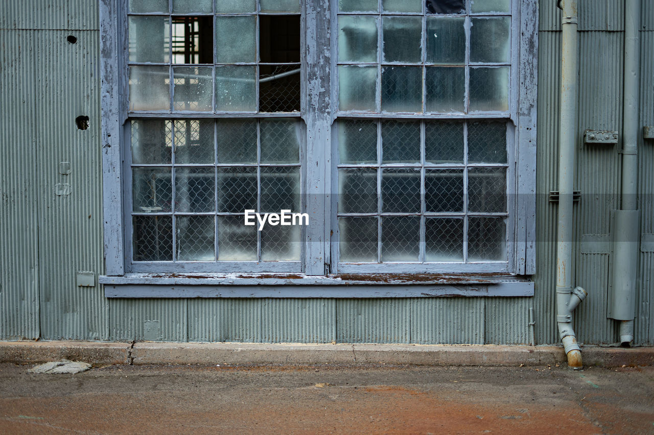 Closed window of old building