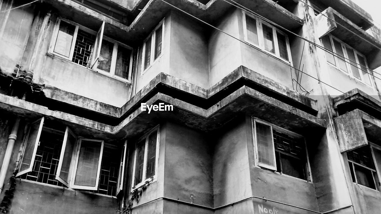 LOW ANGLE VIEW OF RESIDENTIAL BUILDING