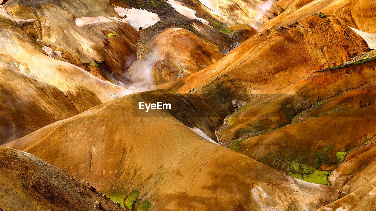 Iceland travel hotspot series volcanic landscape intense colors rhyolith mountains bright daylight