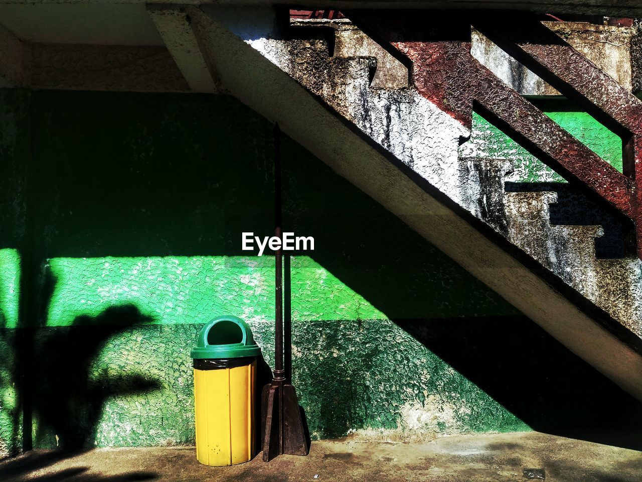 SHADOW OF BUILT STRUCTURE ON WALL