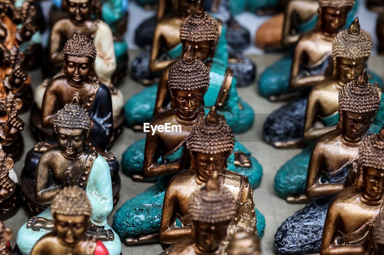 High angle view of buddha figurines for sale