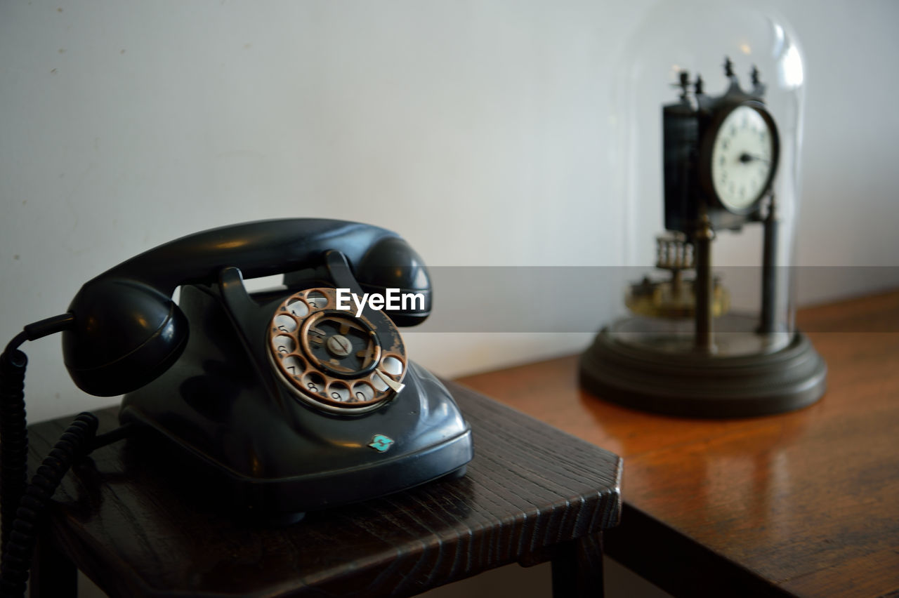 High angle view of telephone on table