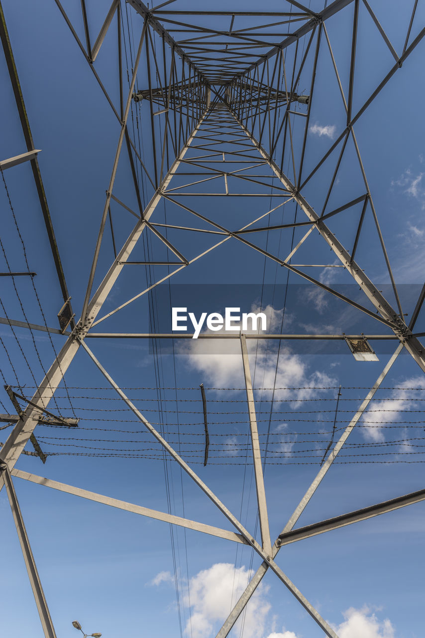 LOW ANGLE VIEW OF ELECTRICITY PYLON AGAINST SKY