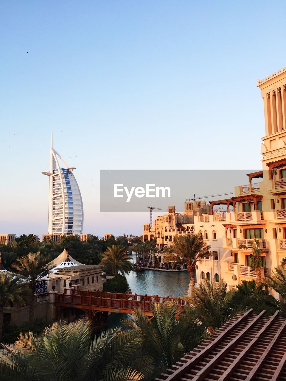 VIEW OF BUILDINGS AGAINST CLEAR BLUE SKY