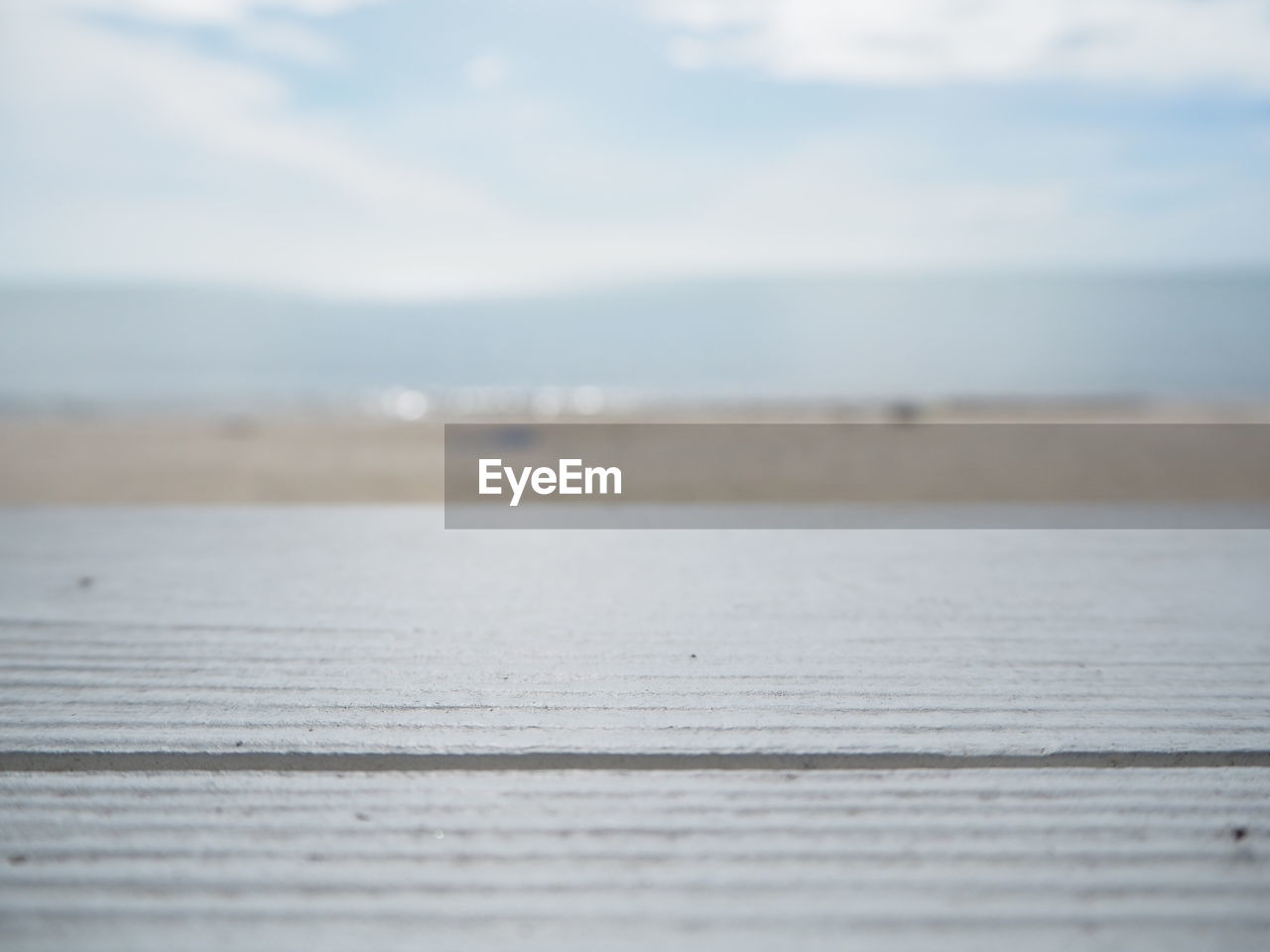 SURFACE LEVEL OF SEA AGAINST SKY