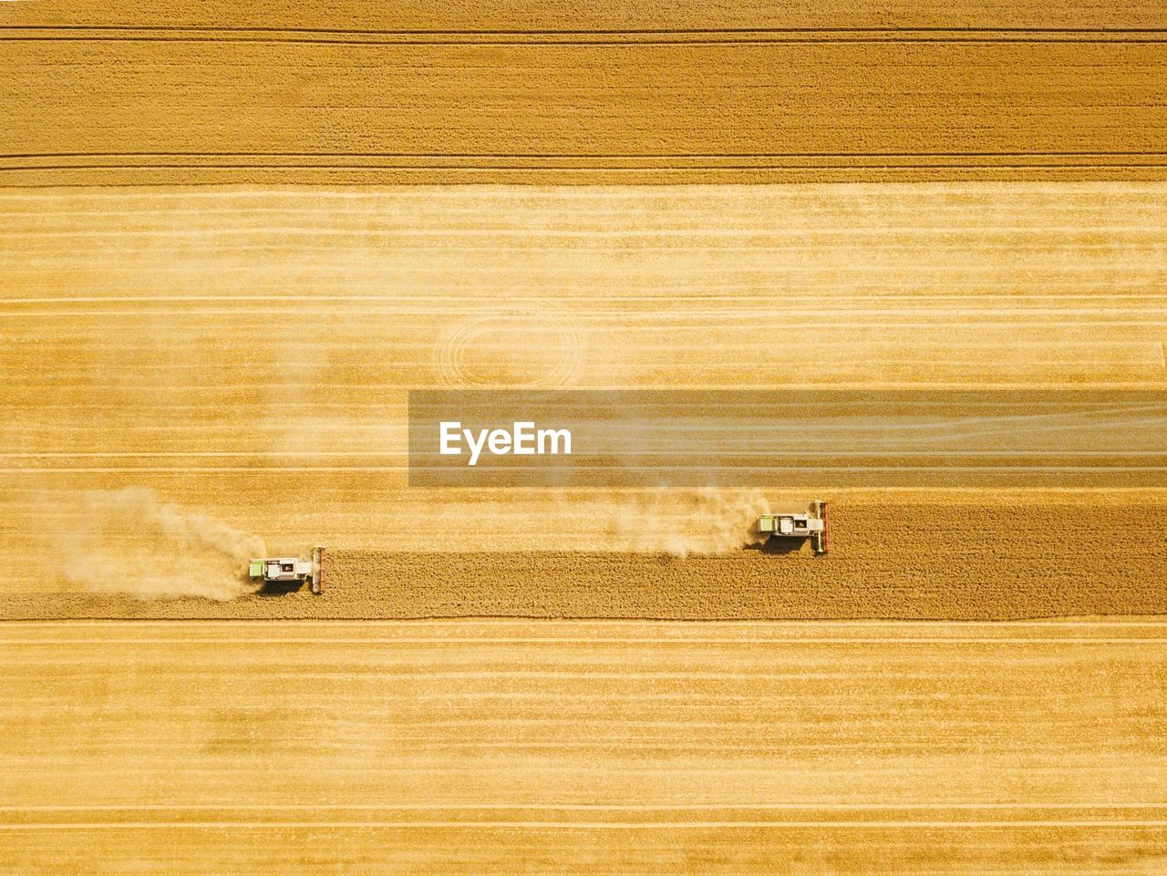 High angle view of tractors on agricultural field