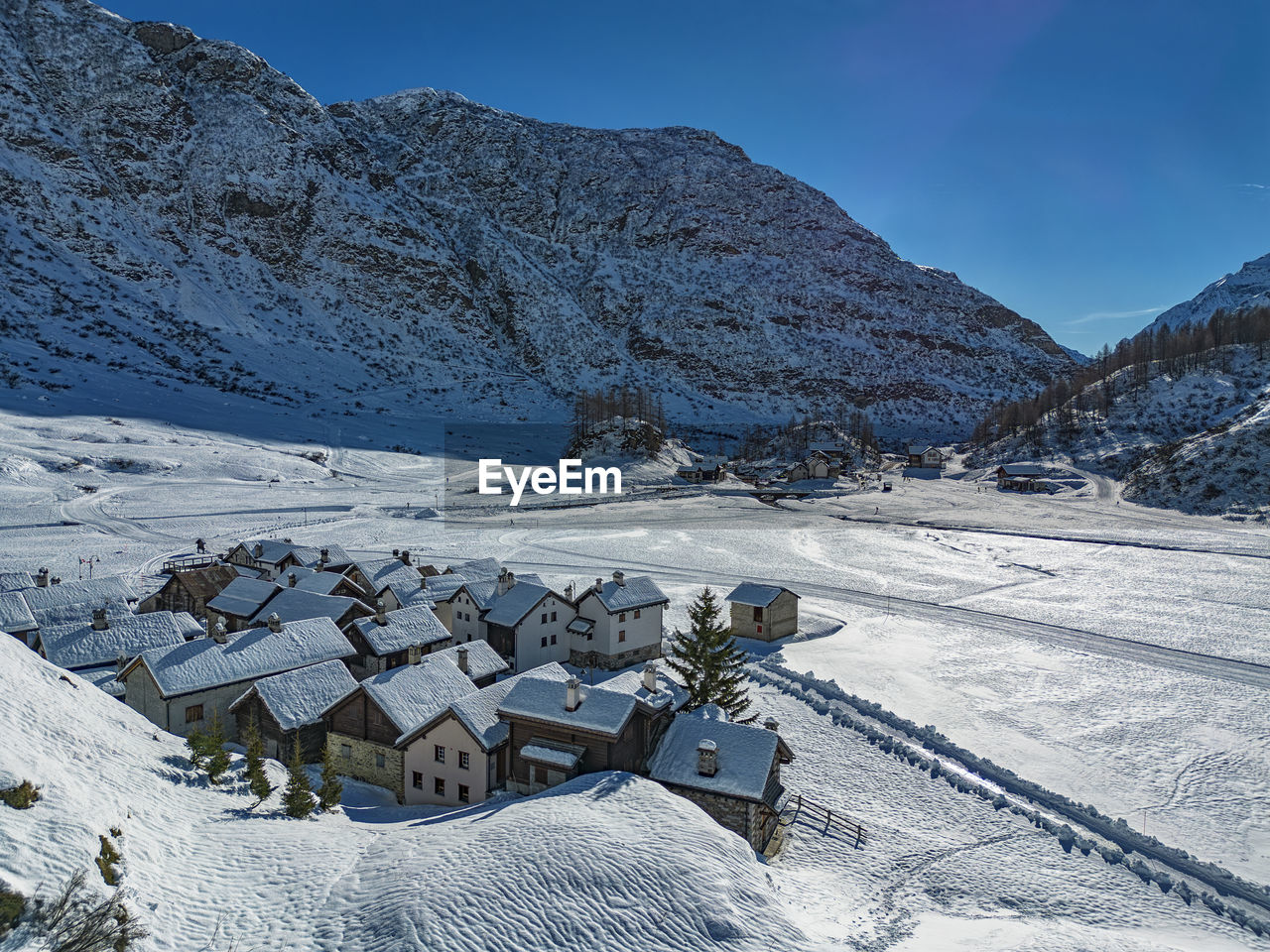 scenic view of snowcapped mountains against clear sky