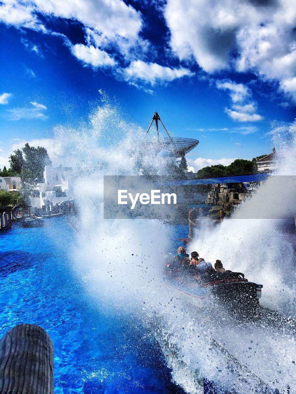 Roller coaster splashing water at pool in europa-park