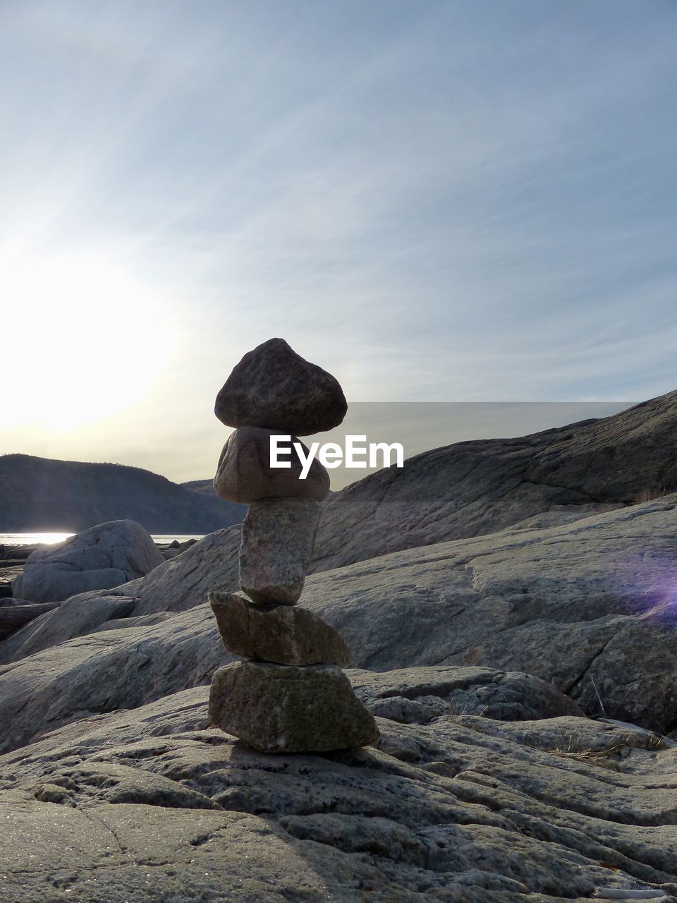 STACK OF ROCKS ON SHORE