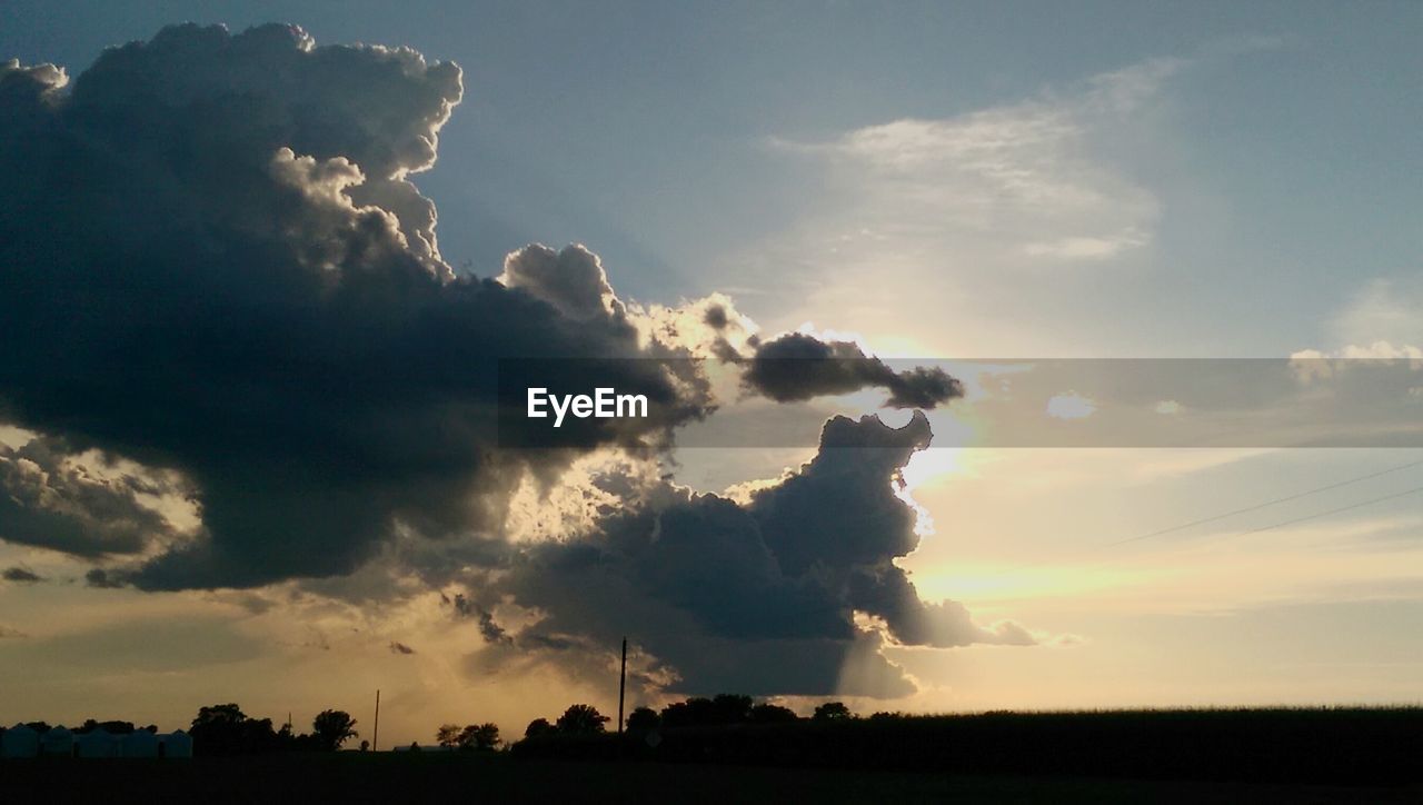 VIEW OF LANDSCAPE AT SUNSET