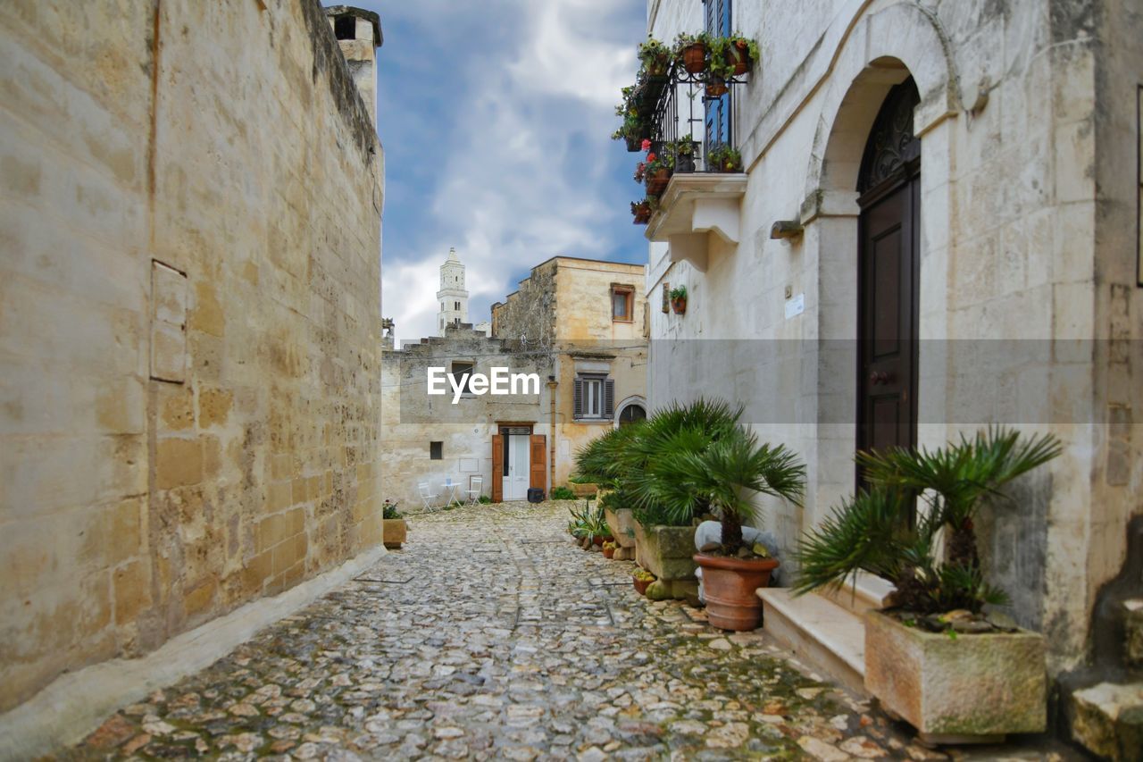 A street in the old town of matera, a city in italy declared a unesco heritage site.