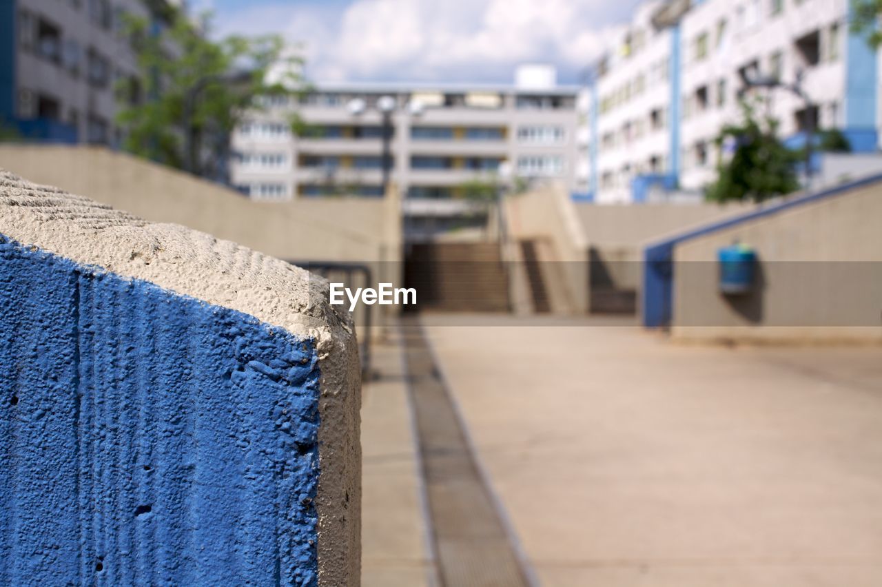 Footpath amidst residential buildings