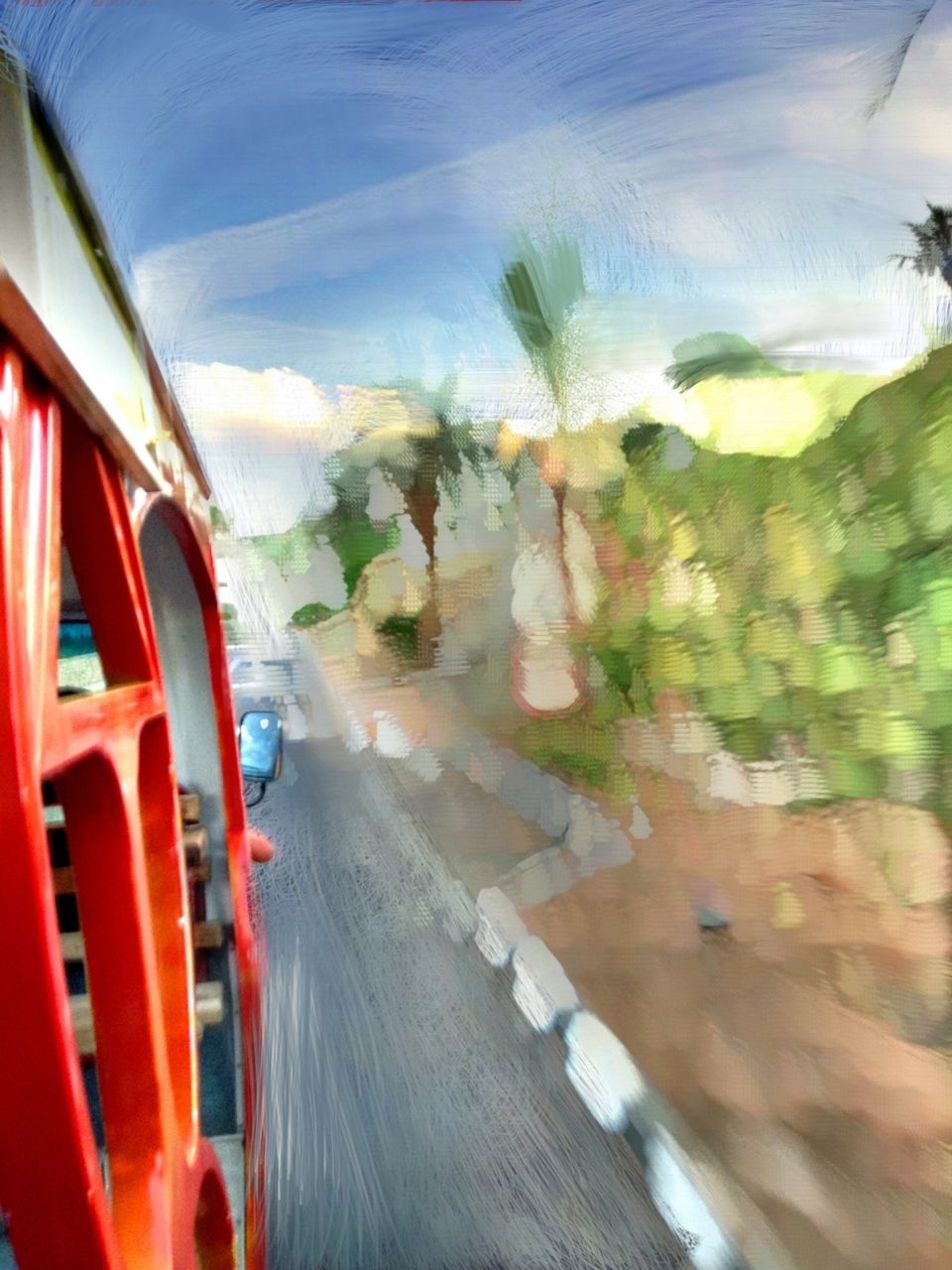 VIEW OF TRAIN ON ROAD