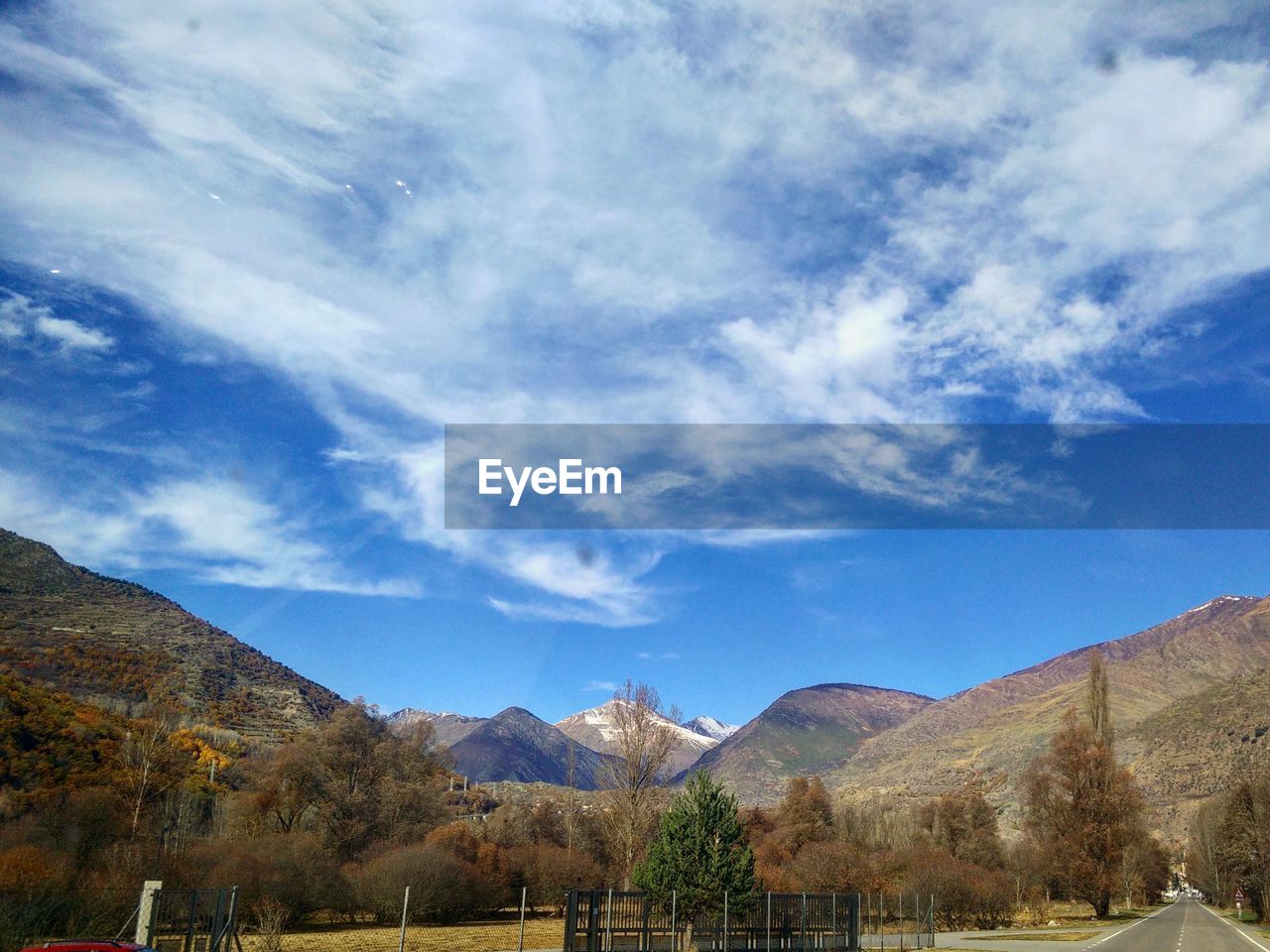 View of landscape against cloudy sky