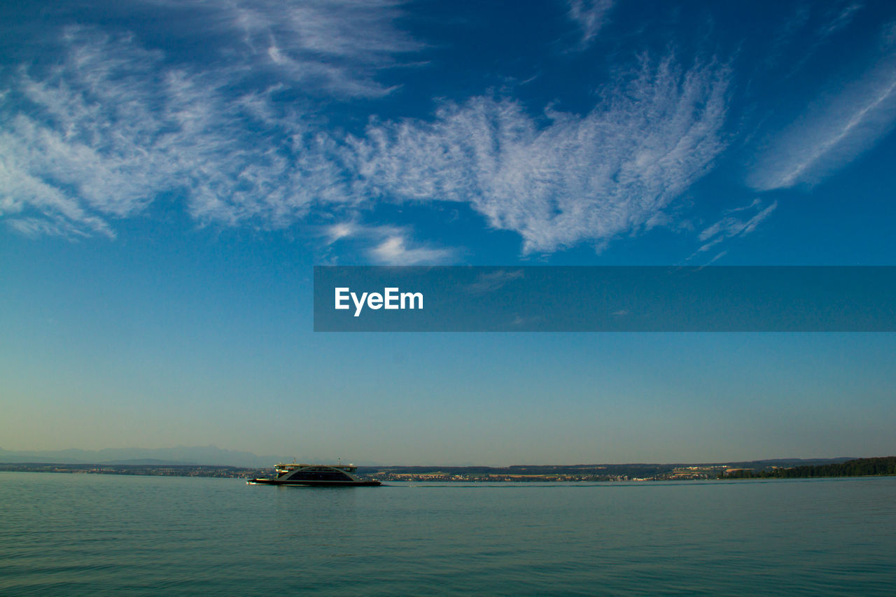 Yacht in lake constance against sky