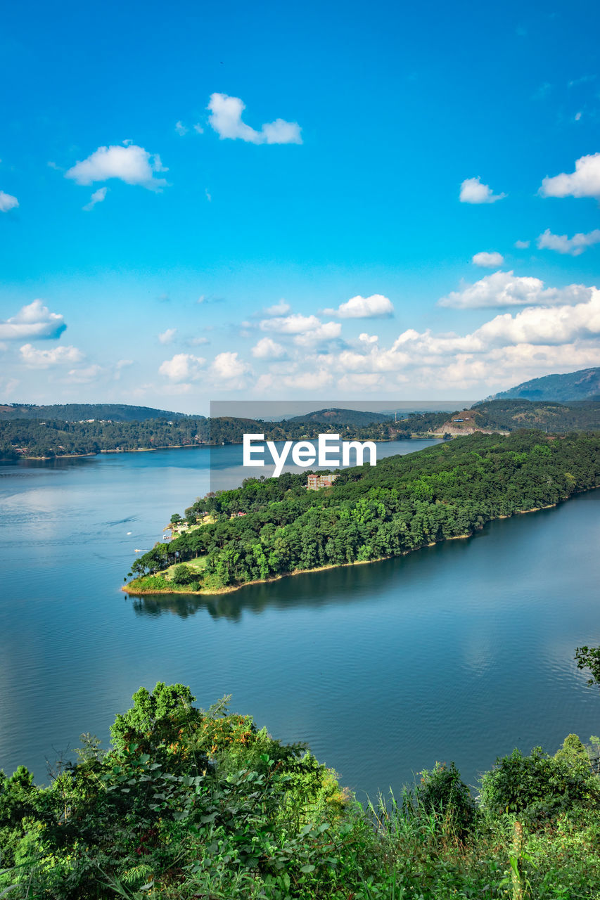 Serene lake with mountain background at day from top angle