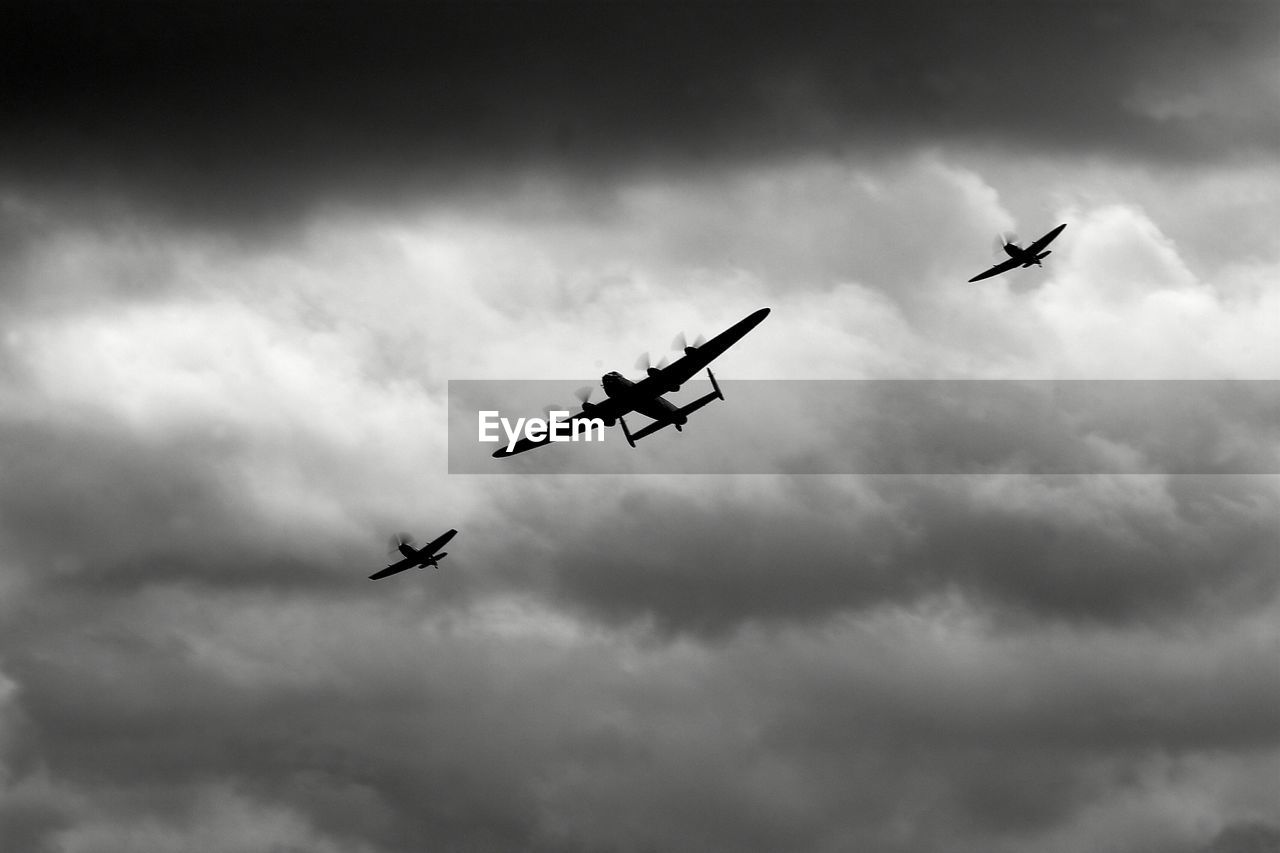 Low angle view of battle of britain memorial flight over bournemouth