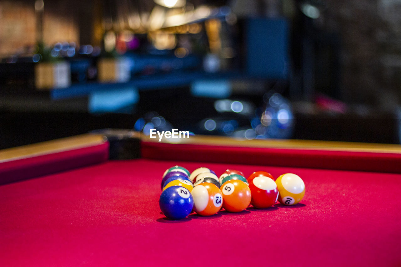 Close-up of multi colored balls on table