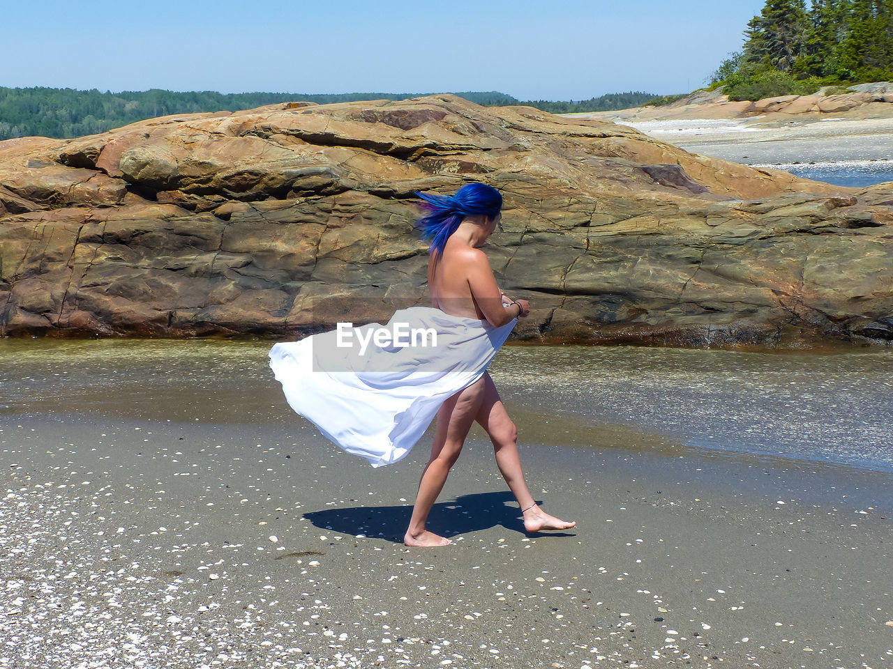 Full length of woman on beach