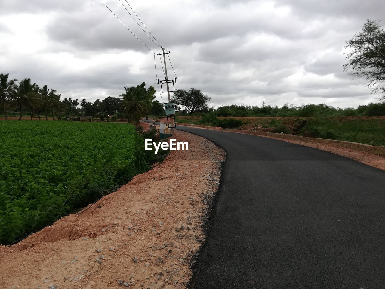 ROAD PASSING THROUGH LANDSCAPE