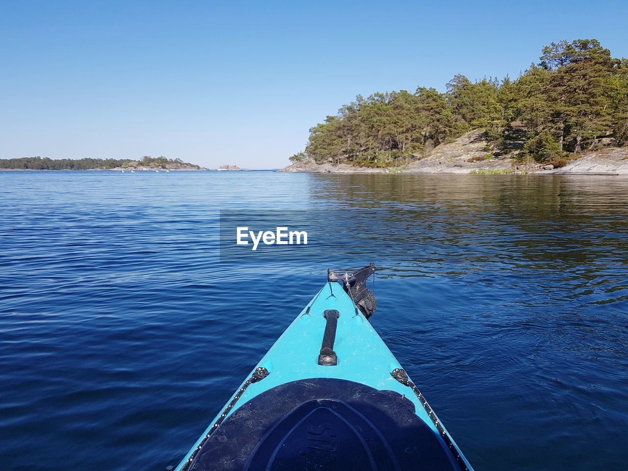 Boat in sea against clear sky