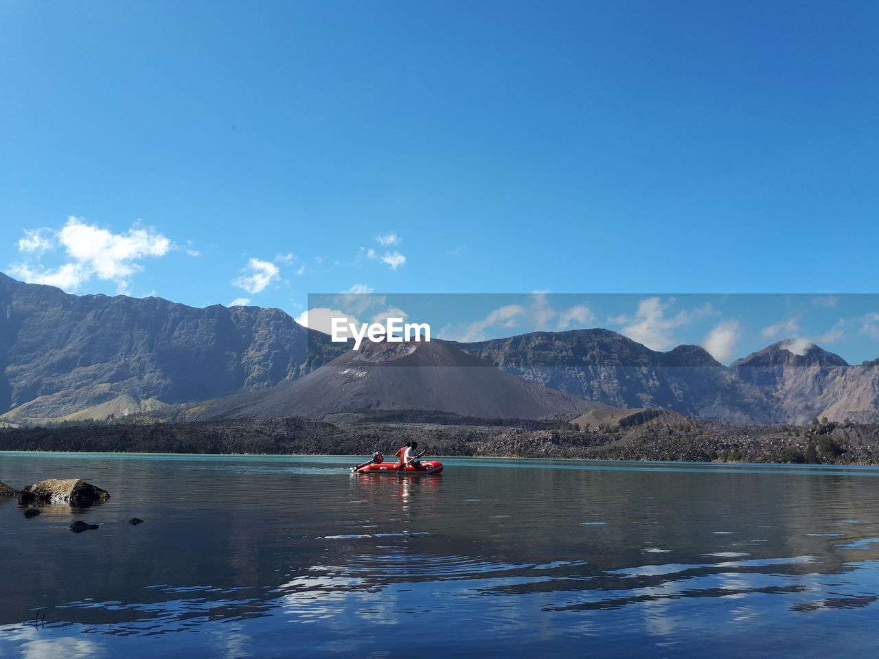 SCENIC VIEW OF LAKE AGAINST MOUNTAINS