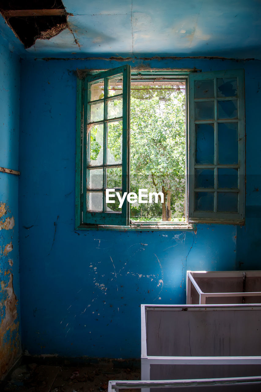 blue, window, house, wall, room, architecture, abandoned, interior design, no people, home, indoors, old, damaged, building, rundown, built structure, day, wall - building feature, domestic room, nature, living room, broken, decline, estate, home interior, ruined, deterioration, weathered