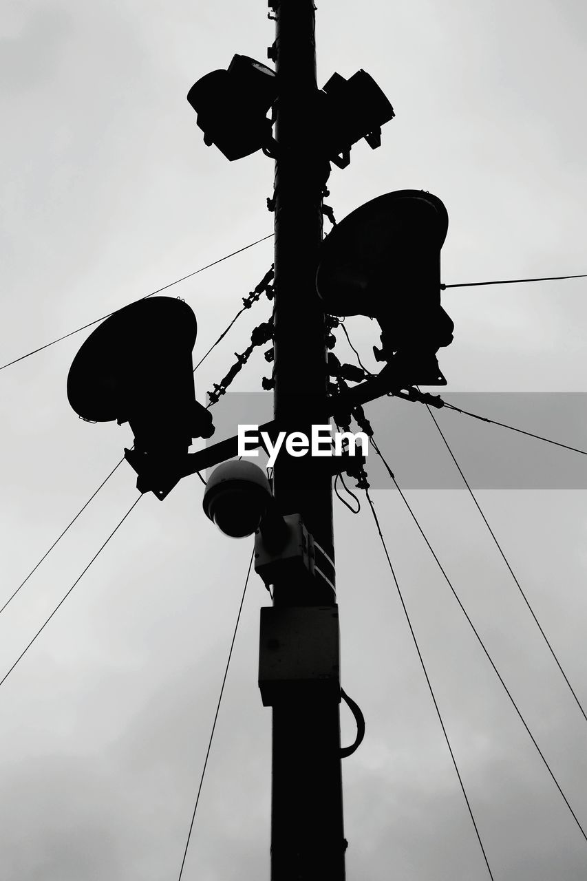 LOW ANGLE VIEW OF SILHOUETTE ELECTRICITY PYLON