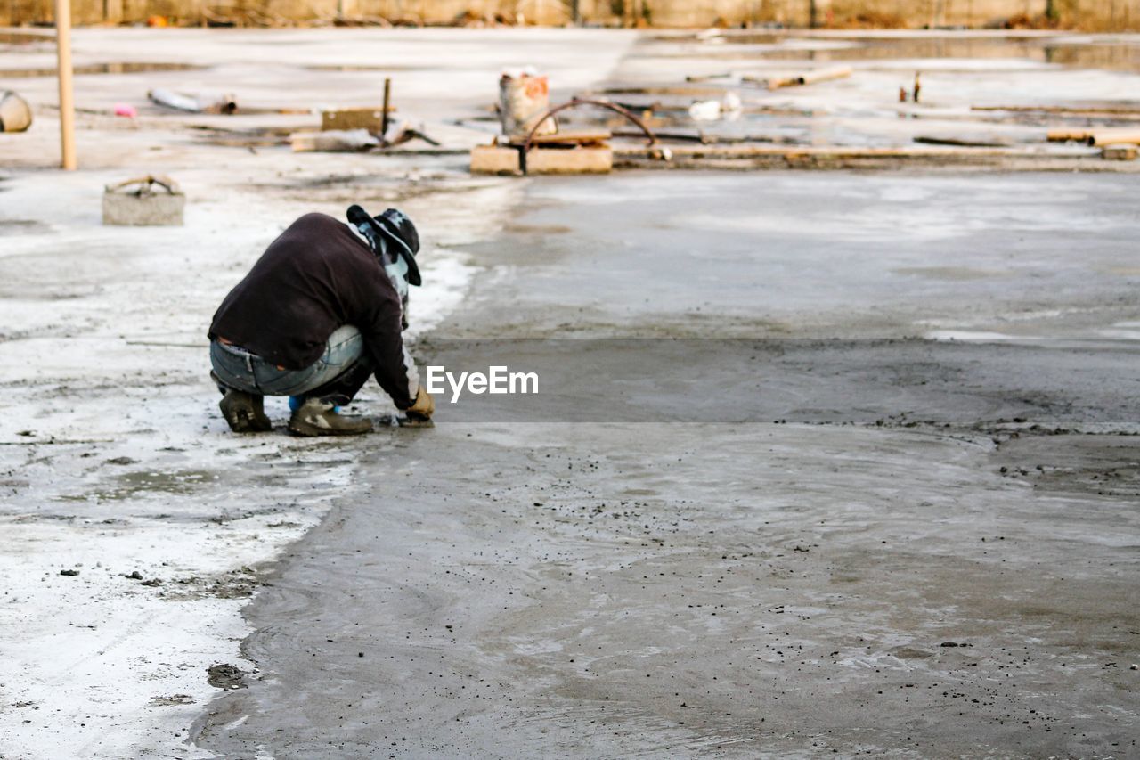 Person in fixing concrete road