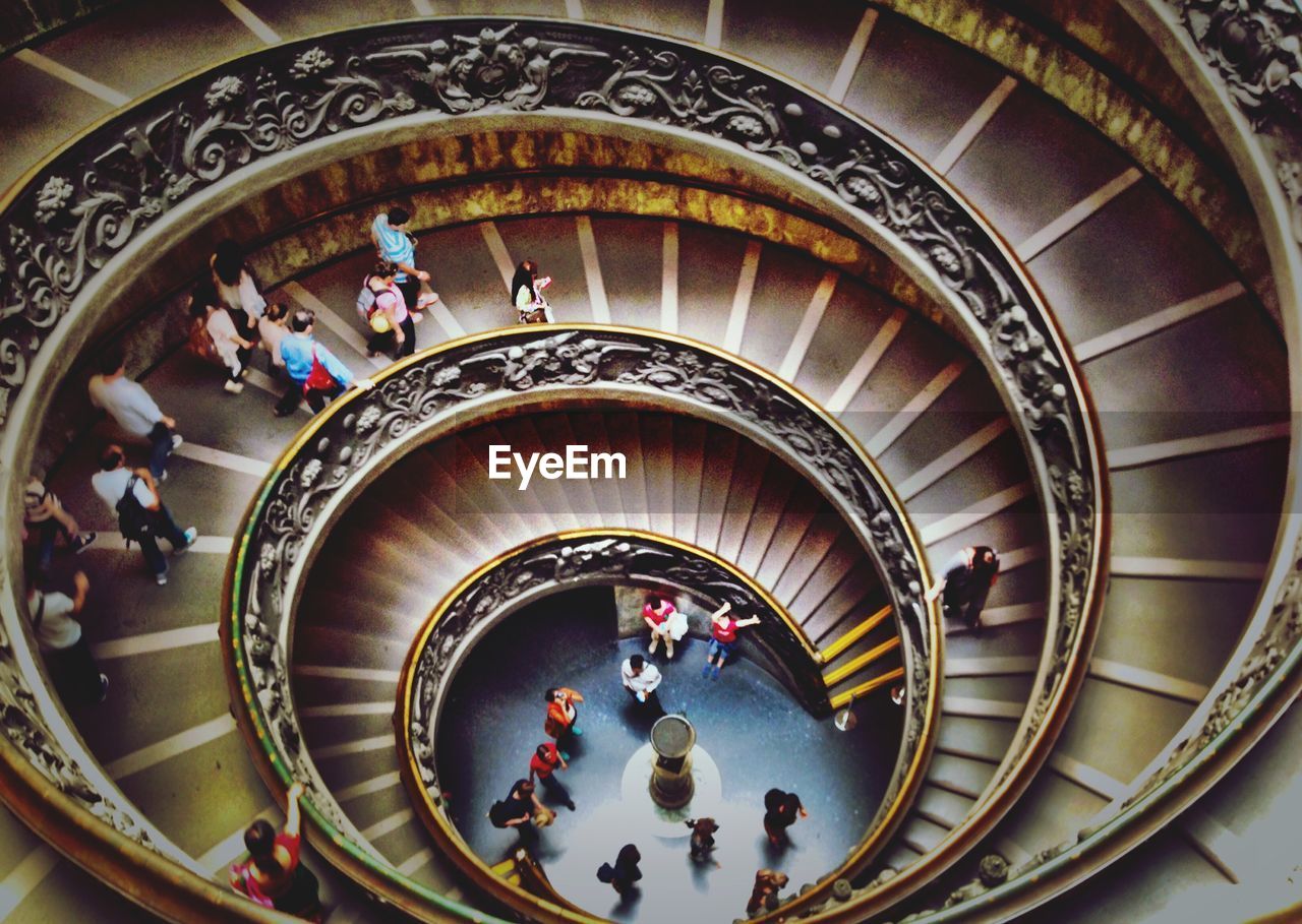 High angle view of people on spiral staircase