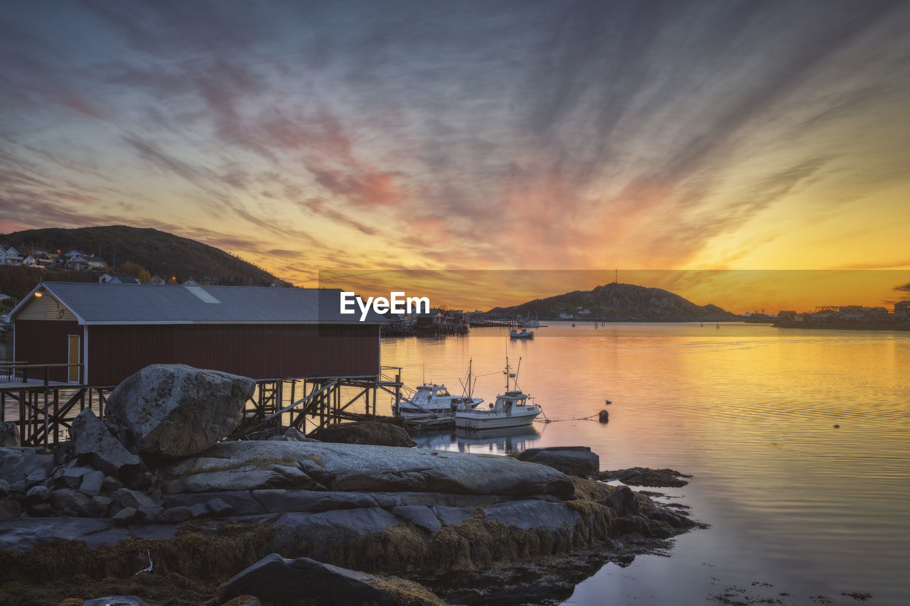 Surroundings of the typical norwegian village of reine at sunset