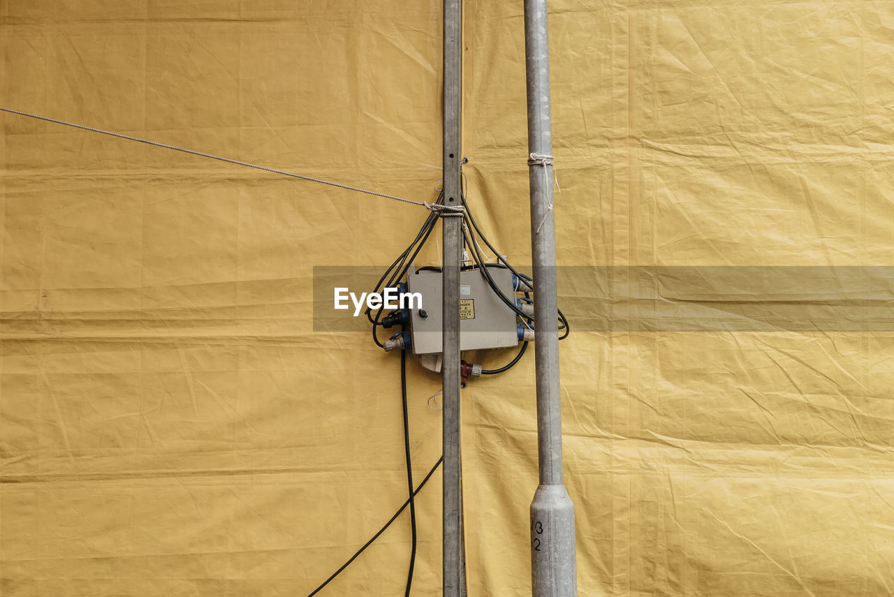 Electrical equipment on pole by tent