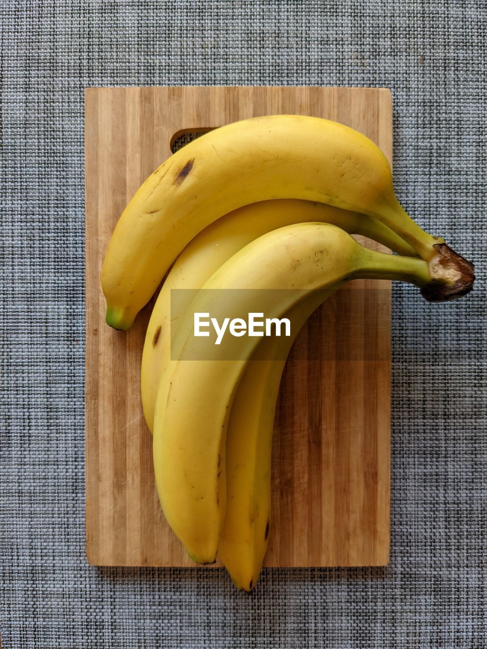 Banana kept on a wooden tray