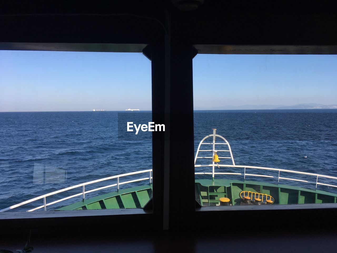 VIEW OF SEA SEEN THROUGH WINDOW